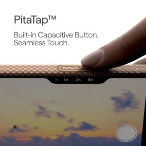 PitaTap built-in capacitive button with seamless touch on a textured device edge, finger near the button name visible in the image.