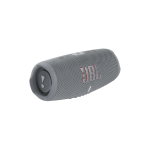 Gray JBL portable Bluetooth speaker lying on its side, fabric-covered cylindrical design.
