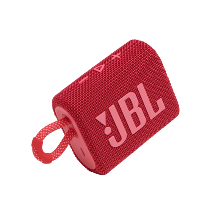 Red JBL portable Bluetooth speaker with fabric cover and loop strap on the side of the device.”] ,