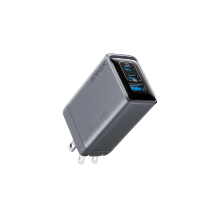 Anker Prime wall charger with three ports (two USB-A blue ports and one USB-C) in a gray, compact block.