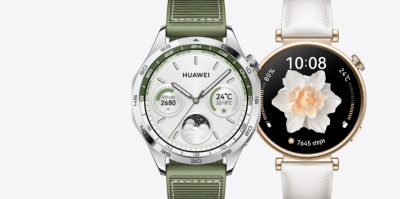 Two Huawei smartwatches side by side: a silver watch with a green strap and multiple dials, and a gold-edged watch with a white strap and flower display.