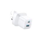 White Anker wall charger with fold-out prongs, showing two USB ports (one with blue interior).