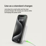 Phone on a dual-purpose charger that powers the device while recharging the power bank.