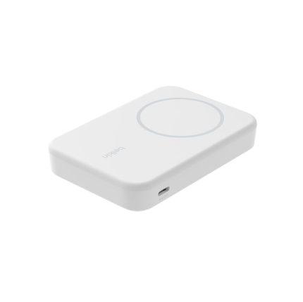 White wireless charging pad with a circular charging area on top