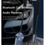 Bluetooth car wireless audio receiver with a blue dial, connected to a car stereo via a 3.5mm jack