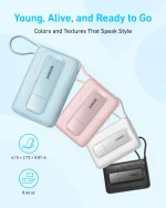 Pastel-colored Anker portable power banks arranged diagonally on a light blue background, brand name visible on each unit, conveying a sleek, stylish charging option.