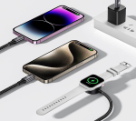 Multiple devices charging: two iPhones connected with braided cables and a smartwatch on a wireless charger, all on a white surface.