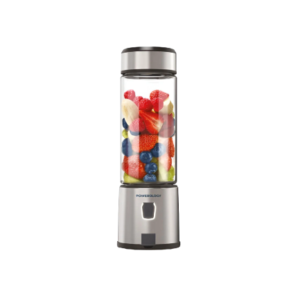 Countertop blender with a transparent jar filled with sliced fruit (strawberries, bananas, blueberries, raspberries, kiwi) showing a mixed fruit smoothie base.